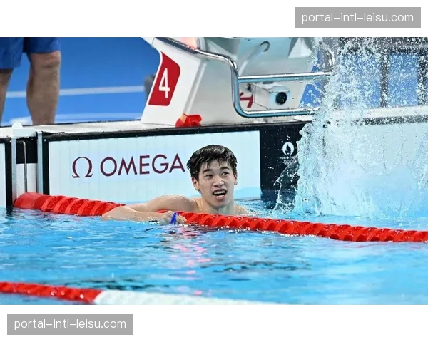 世界泳联锦标赛：中国选手潘展乐打破男子100米自由泳世界纪录夺冠